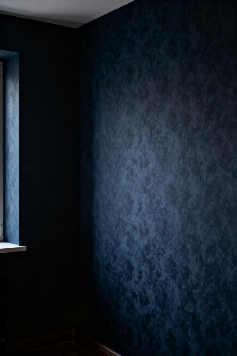 Room with dark, heavy wallpaper that absorbs light and makes the low-light space appear even dimmer.