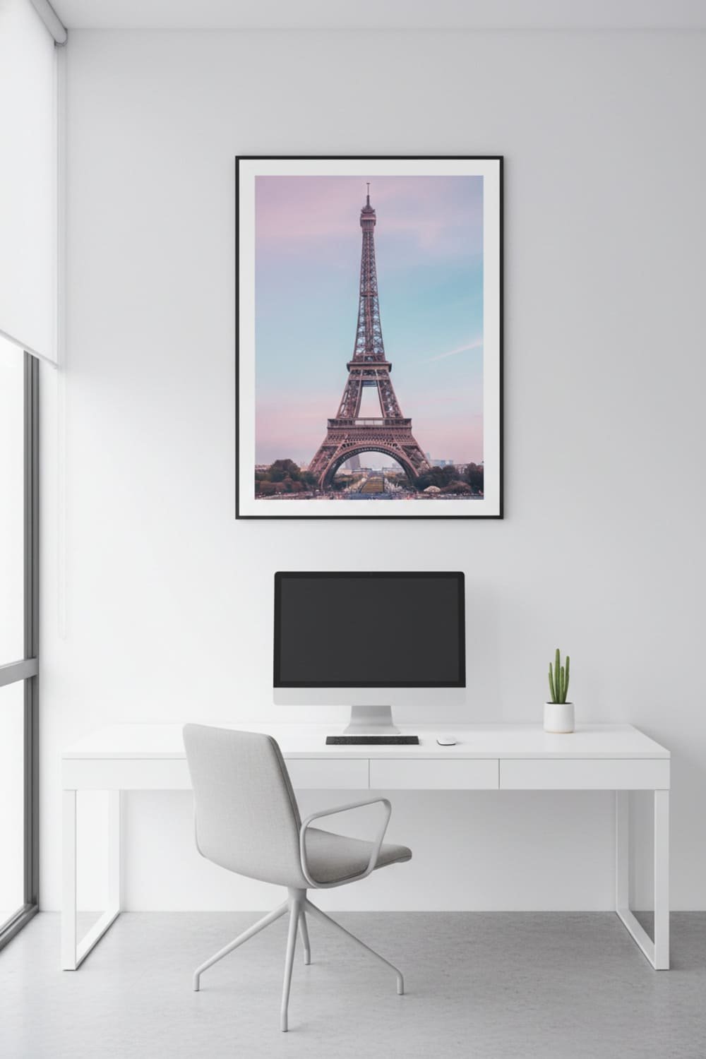 Stylized Eiffel Tower printable poster framed above a sleek modern desk in a minimalist office.