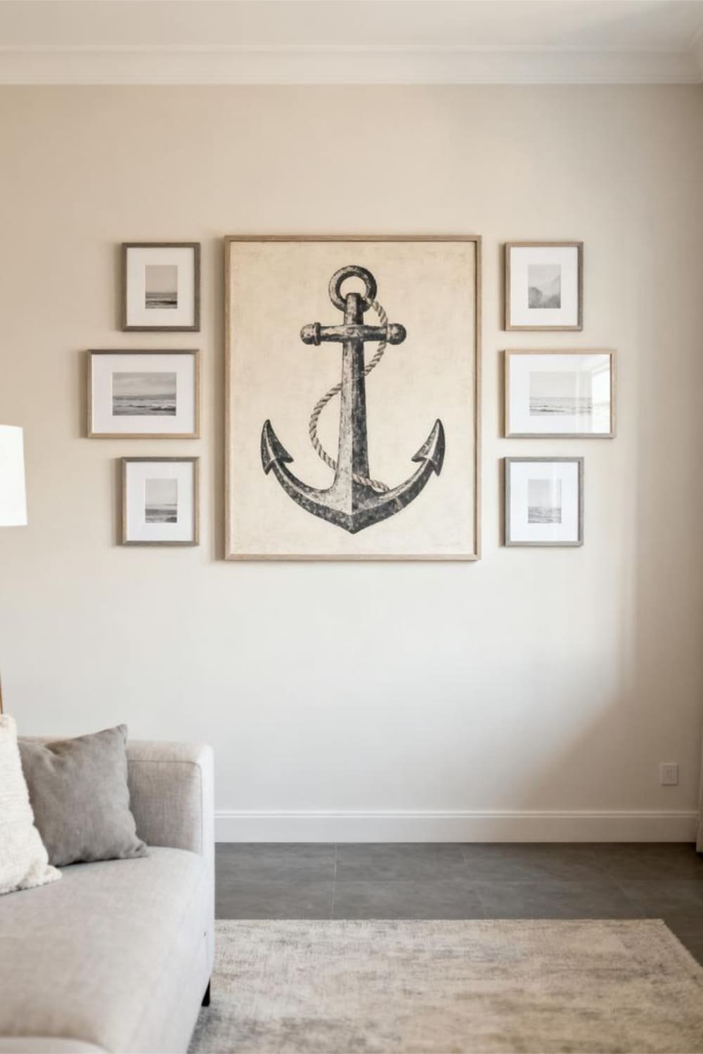 Minimalist gallery wall mixing large and small frames with clean alignment